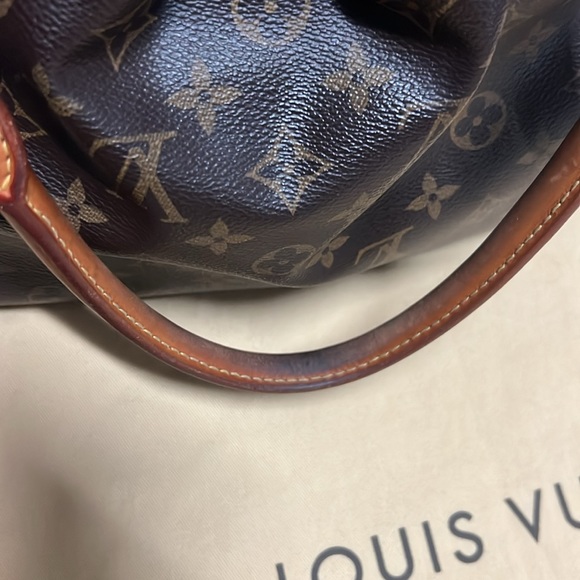 Authentic Louis Vuitton Tivoli GM 
With box, dust cover, and original receipt. - Picture 15 of 16